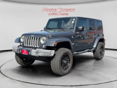 Silver 2016 Jeep Wrangler Unlimited Sahara for sale in St. Louis, MO