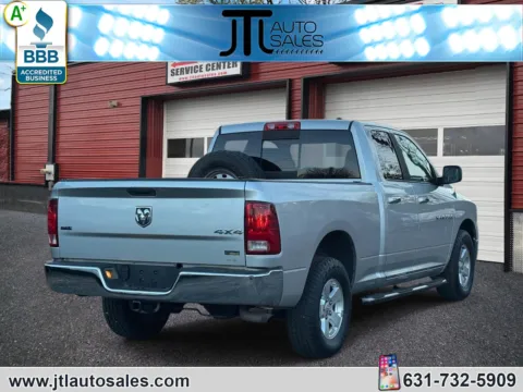 Another view of 2011 Ram 1500 4WD Quad Cab 140.5 SLT for sale in Selden, NY at JTL Auto Sales Inc.
