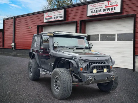 Photos of 2010 Jeep Wrangler 4WD 2dr Sport for sale in Selden, NY at JTL Auto Sales Inc.