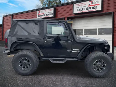 Another view of 2010 Jeep Wrangler 4WD 2dr Sport for sale in Selden, NY at JTL Auto Sales Inc.