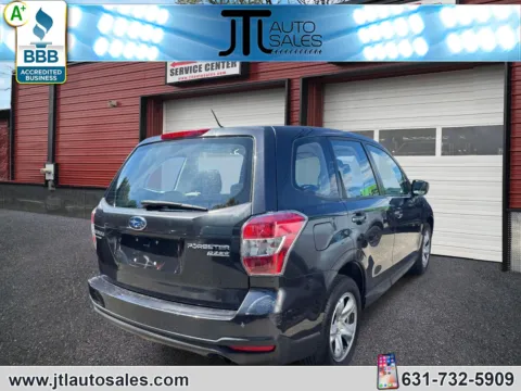 Another view of 2014 Subaru Forester 4dr Auto 2.5i PZEV for sale in Selden, NY at JTL Auto Sales Inc.