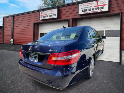 Another view of 2013 Mercedes-Benz E-Class E350 4MATIC Luxury Sedan for sale in Selden, NY at JTL Auto Sales Inc.