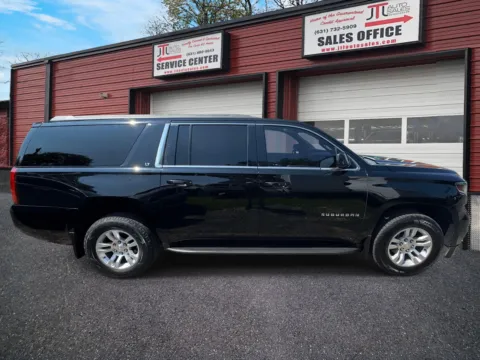 Another view of 2017 Chevrolet Suburban 4WD 4dr 1500 LT for sale in Selden, NY at JTL Auto Sales Inc.