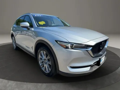 Photos of 2021 MAZDA CX-5 Grand Touring Sport Utility 4D for sale in Taunton, MA at Gesner Auto