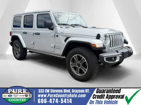Silver 2023 Jeep Wrangler Sahara for sale in Grayson, KY
