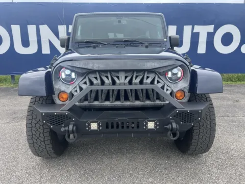 Photos of 2013 Jeep Wrangler Unlimited Sahara for sale in Grayson, KY at Pure Country Automotive