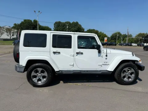 Another view of 2017 Jeep Wrangler Unlimited Sahara Sport Utility 4D for sale in Manchester, CT at Drivemax