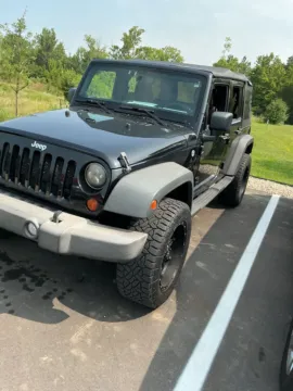 Photos of 2013 Jeep Wrangler Unlimited Sport for sale in Westfield, IN at Indy Auto Man - Westfield