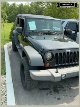 Black 2013 Jeep Wrangler Unlimited Sport for sale in Westfield, IN