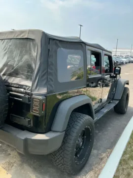 Another view of 2013 Jeep Wrangler Unlimited Sport for sale in Westfield, IN at Indy Auto Man - Westfield