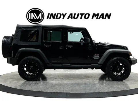 Another view of 2013 Jeep Wrangler Unlimited Sport for sale in Westfield, IN at Indy Auto Man - Westfield