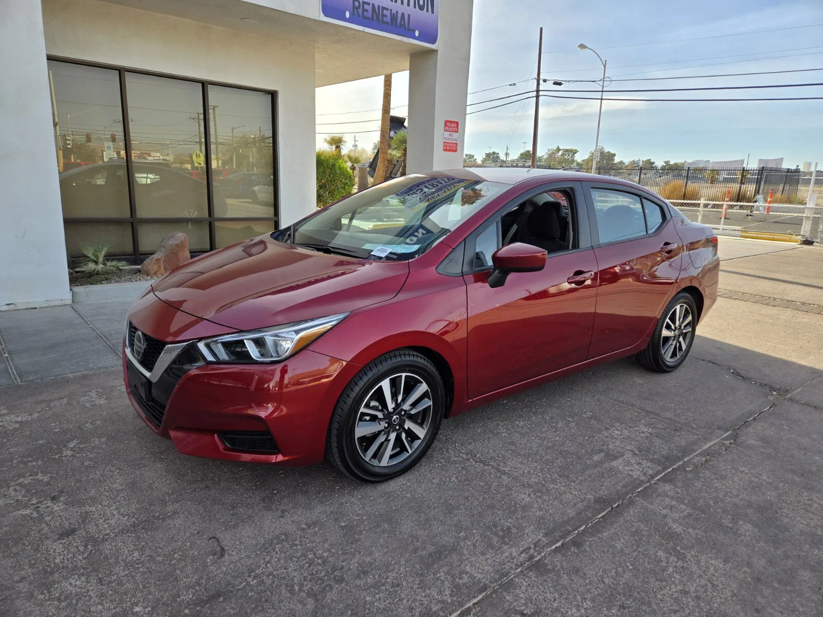 Red 2022 Nissan Versa SV for sale in Las Vegas, NV