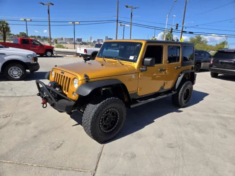 Brown 2014 Jeep Wrangler Unlimited Sport for sale in Las Vegas, NV