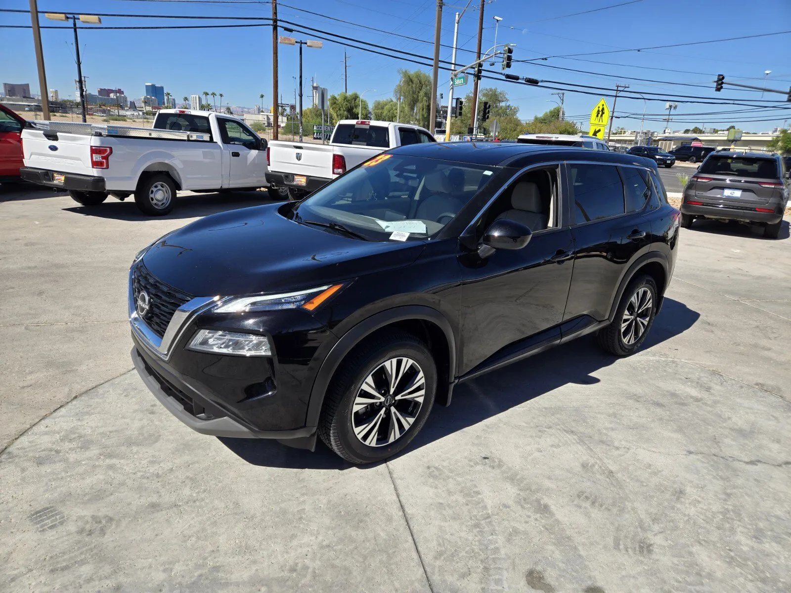 Black 2023 Nissan Rogue SV for sale in Las Vegas, NV