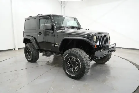 Black 2012 Jeep Wrangler Sahara for sale in Logan, OH