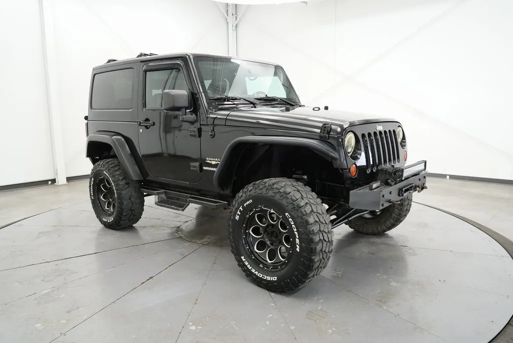 Black 2012 Jeep Wrangler Sahara for sale in Logan, OH