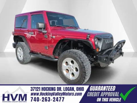 Red 2012 Jeep Wrangler Sahara for sale in Logan, OH