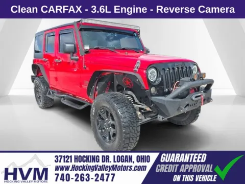 Red 2016 Jeep Wrangler Unlimited Sport for sale in Logan, OH