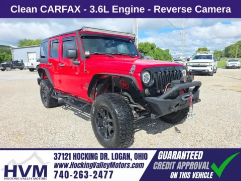 Red 2016 Jeep Wrangler Unlimited Sport for sale in Logan, OH