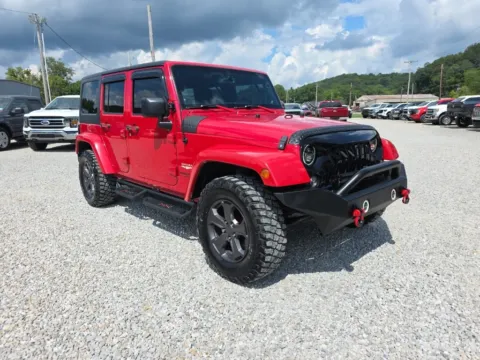Red 2014 Jeep Wrangler Unlimited Sahara for sale in Logan, OH