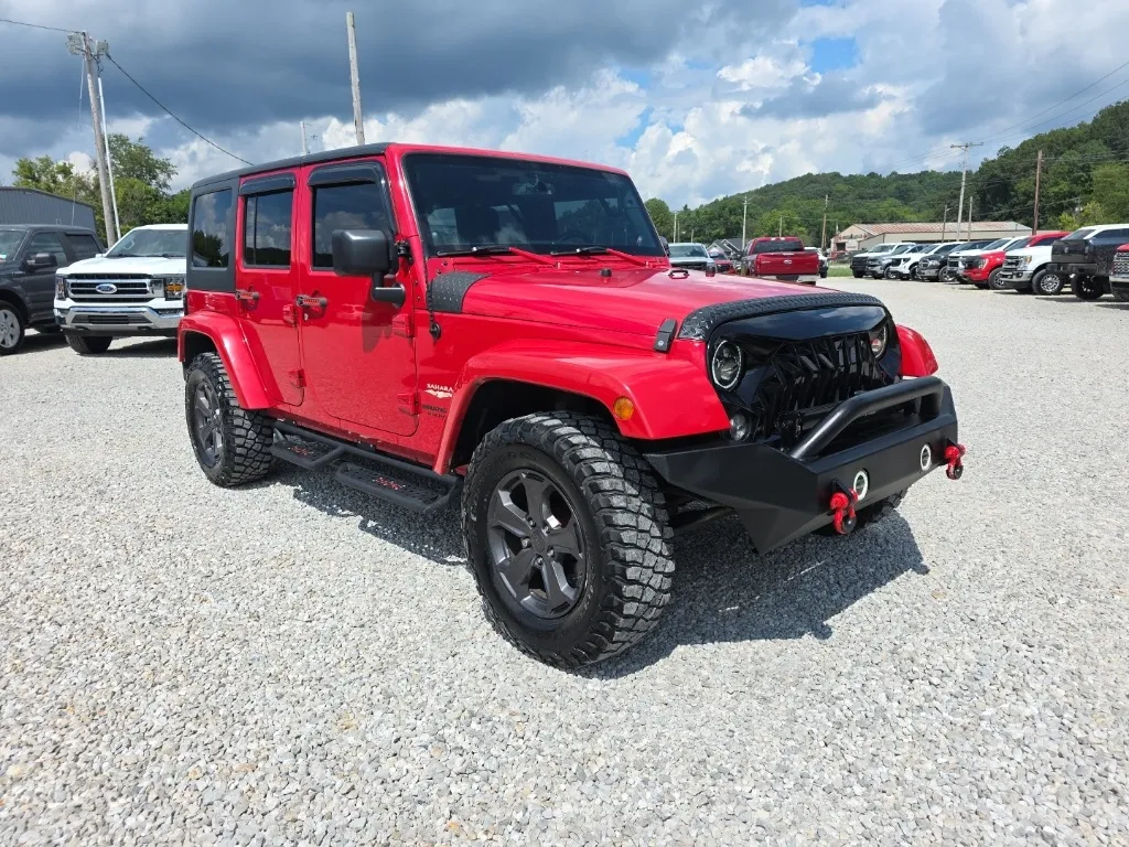 Red 2014 Jeep Wrangler Unlimited Sahara for sale in Logan, OH