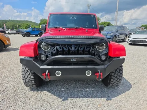 Photos of 2014 Jeep Wrangler Unlimited Sahara for sale in Logan, OH at Hocking Valley Motors