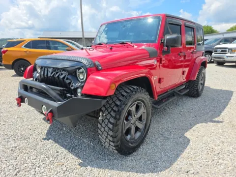 Another view of 2014 Jeep Wrangler Unlimited Sahara for sale in Logan, OH at Hocking Valley Motors