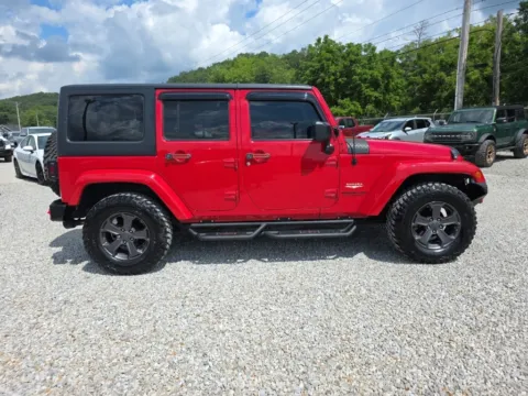 More photos of 2014 Jeep Wrangler Unlimited Sahara at Hocking Valley Motors, OH