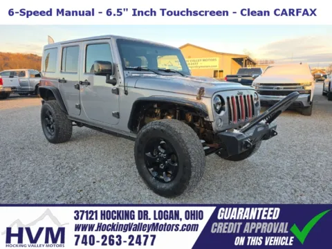Silver 2015 Jeep Wrangler Unlimited Sahara Altitude for sale in Logan, OH