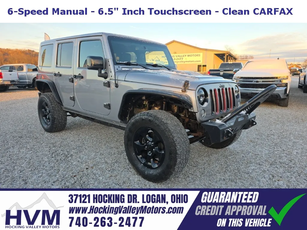 Silver 2015 Jeep Wrangler Unlimited Sahara Altitude for sale in Logan, OH