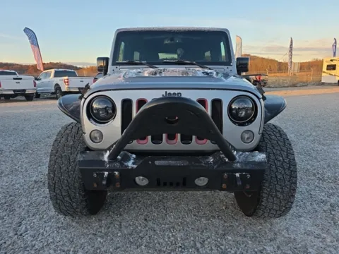 Photos of 2015 Jeep Wrangler Unlimited Sahara Altitude for sale in Logan, OH at Hocking Valley Motors