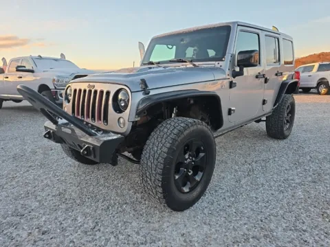 Another view of 2015 Jeep Wrangler Unlimited Sahara Altitude for sale in Logan, OH at Hocking Valley Motors