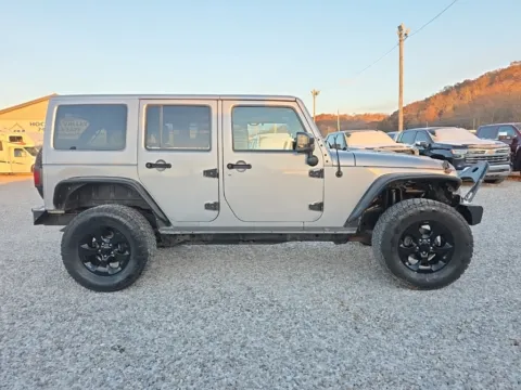 More photos of 2015 Jeep Wrangler Unlimited Sahara Altitude at Hocking Valley Motors, OH