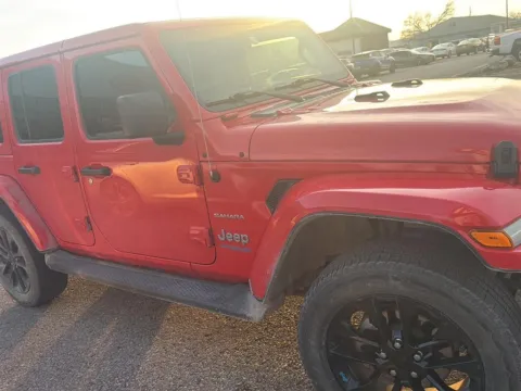 Photos of 2022 Jeep Wrangler 4xe Unlimited Sahara for sale in Lawrence, KS at Cable Dahmer Kia of Lawrence