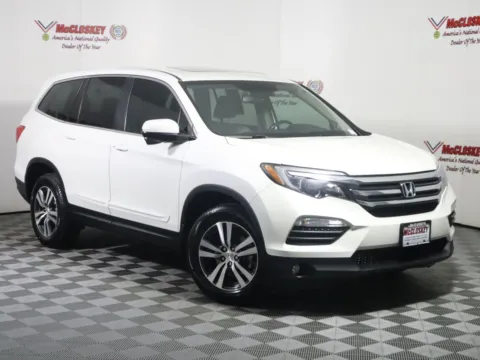 Photos of 2018 Honda Pilot EX-L for sale in Colorado Springs, CO at McCloskey Imports & 4x4s (Licensed as McCloskey Isuzu)