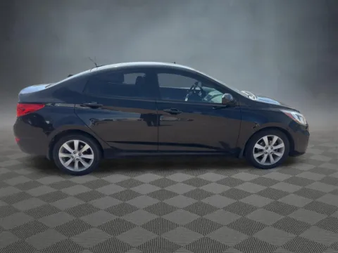 Photos of 2013 Hyundai Accent GLS for sale in Colorado Springs, CO at McCloskey Imports & 4x4s (Licensed as McCloskey Isuzu)