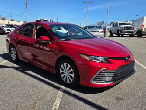 Red 2024 Toyota Camry Hybrid LE for sale in Macon, GA