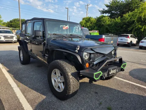 Black 2012 Jeep Wrangler Unlimited Sport for sale in Warner Robins, GA