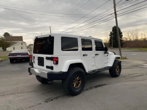 Another view of 2013 Jeep Wrangler Unlimited Sahara for sale in Rome, NY at Fazio's Auto Sales