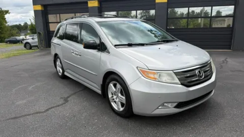 Photos of 2013 Honda Odyssey Touring Minivan 4D for sale in Pottstown, PA at Reliable Car Connection