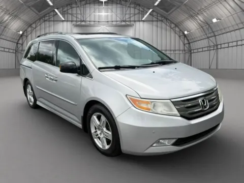 Photos of 2013 Honda Odyssey Touring Minivan 4D for sale in Pottstown, PA at Reliable Car Connection