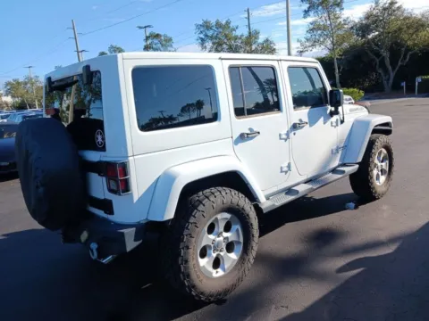 Another view of 2013 Jeep Wrangler Unlimited Sahara for sale in Indianapolis, IN at AutoGiant USA Indianapolis