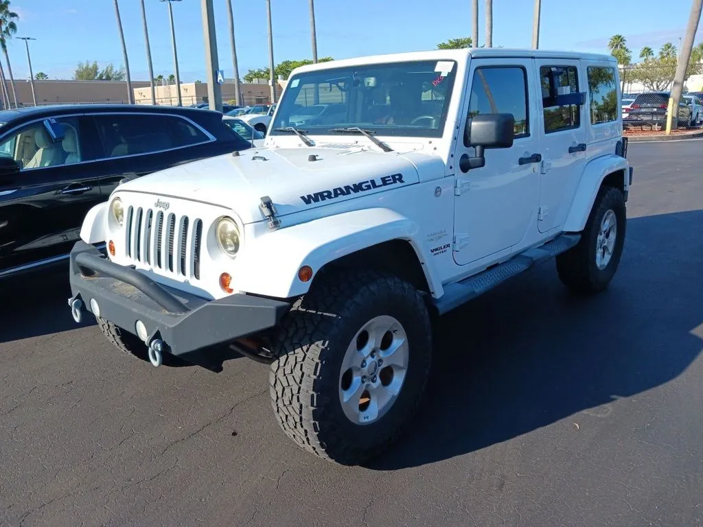 Silver 2013 Jeep Wrangler Unlimited Sahara for sale in Indianapolis, IN