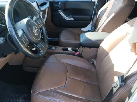 More photos of 2013 Jeep Wrangler Unlimited Sahara at AutoGiant USA Indianapolis, IN