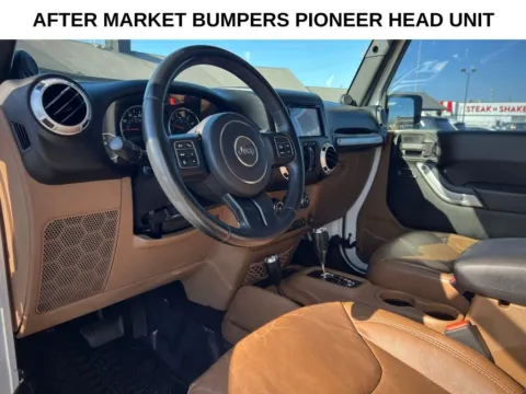 Photos of 2013 Jeep Wrangler Unlimited Sahara for sale in Indianapolis, IN at AutoGiant USA Indianapolis