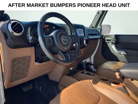 Photos of 2013 Jeep Wrangler Unlimited Sahara for sale in Indianapolis, IN at AutoGiant USA Indianapolis