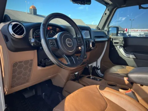 Photos of 2013 Jeep Wrangler Unlimited Sahara for sale in Indianapolis, IN at AutoGiant USA Indianapolis