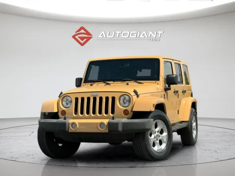 Brown 2013 Jeep Wrangler Unlimited Sahara for sale in Indianapolis, IN