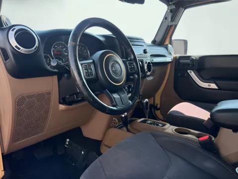 Photos of 2013 Jeep Wrangler Unlimited Sahara for sale in Indianapolis, IN at AutoGiant USA Indianapolis