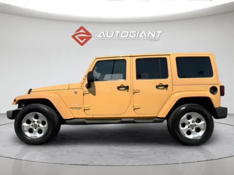 Another view of 2013 Jeep Wrangler Unlimited Sahara for sale in Indianapolis, IN at AutoGiant USA Indianapolis